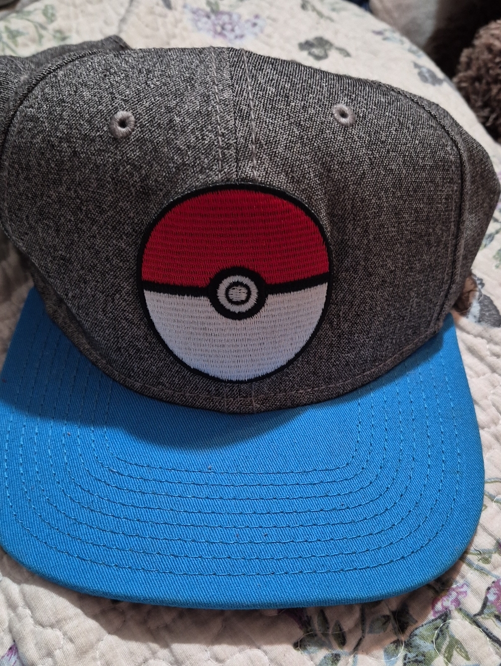 Pokemon Gray Snapback Hat with Blue Brim and Red & White Poké Ball Patch